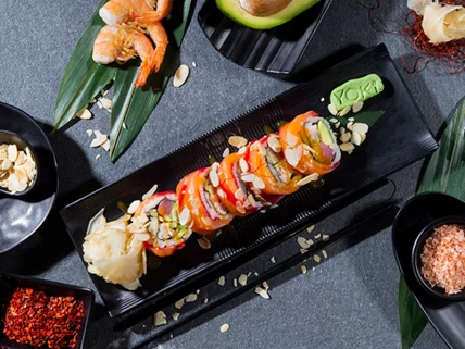 Signature roll with salmon and mango-chili